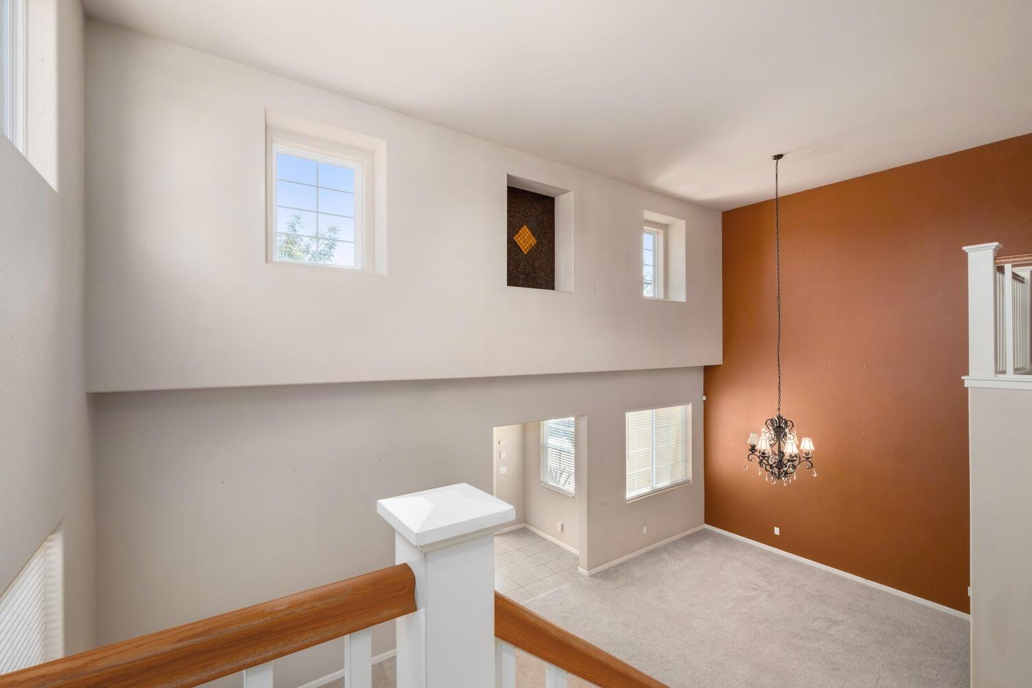 1182 Carson Avenue Clovis, CA 93611 - Photo 20 of 38 a view of an empty room with windows