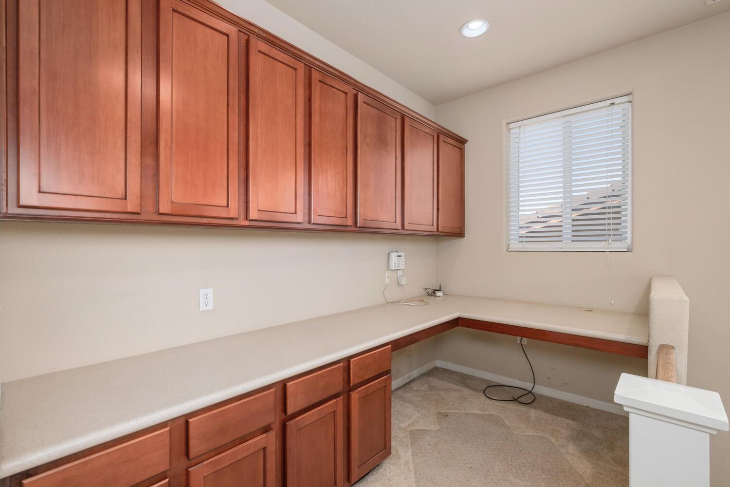 1182 Carson Avenue Clovis, CA 93611 - Photo 21 of 38 a room with storage and utility