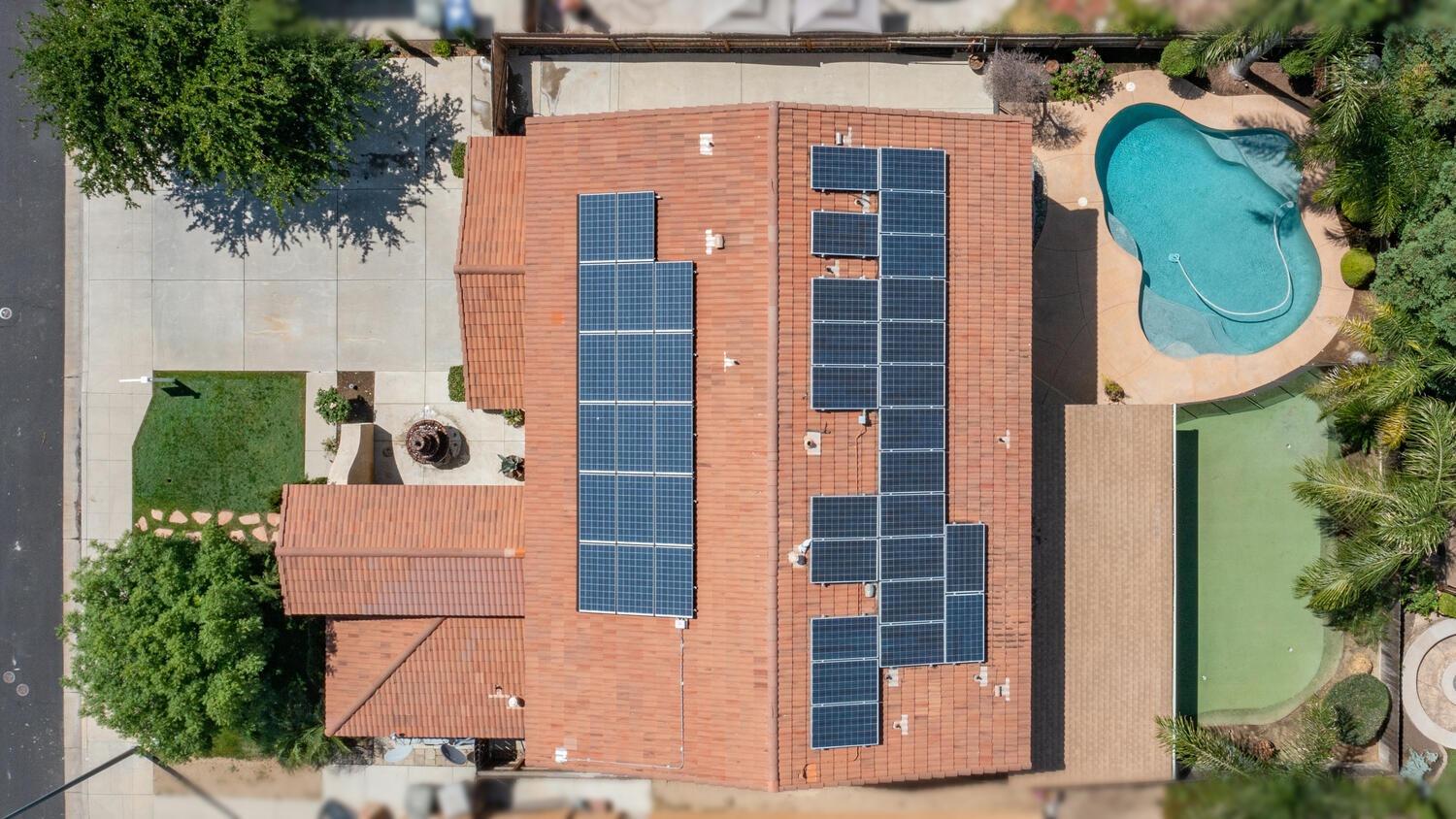 1182 Carson Avenue Clovis, CA 93611 - Photo 38 of 38 a front view of a house with a garden
