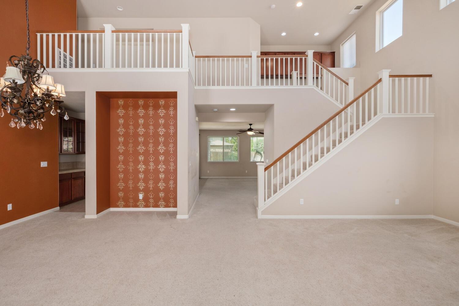 1182 Carson Avenue Clovis, CA 93611 - Photo 6 of 38 a view of an entryway with a hallway