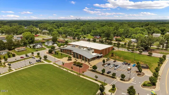 an aerial view of a house with a ocean view