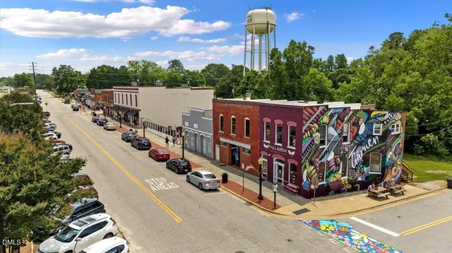 a view of a street with sitting space