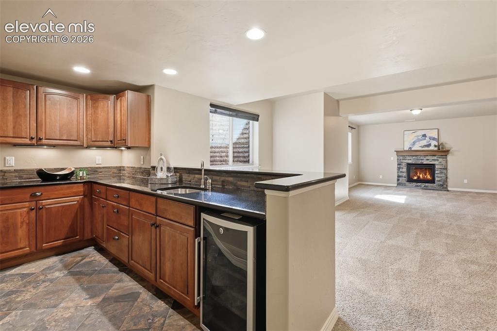 13184 Cake Bread Heights Colorado Springs, CO 80921 - Photo 29 of 47 Full wet bar with granite countertops