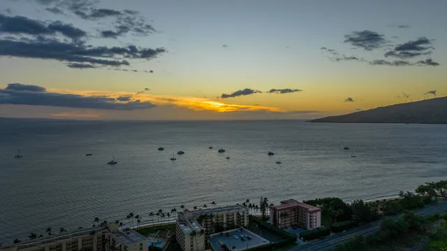 a view of a balcony with wooden floor