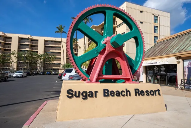 a view of a dining area with furniture and a mirror