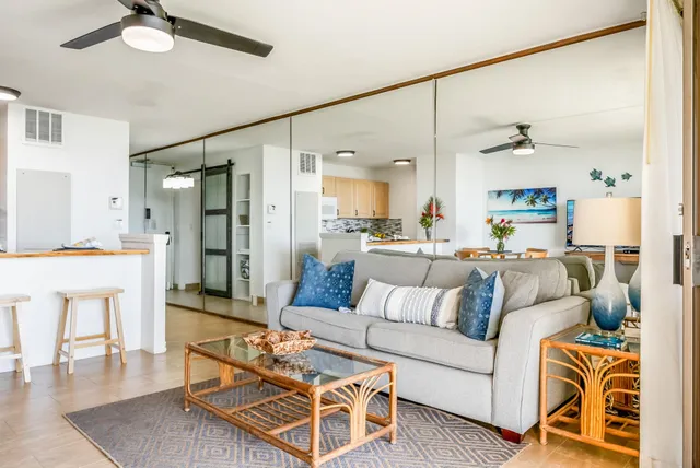 a living room with furniture and a table