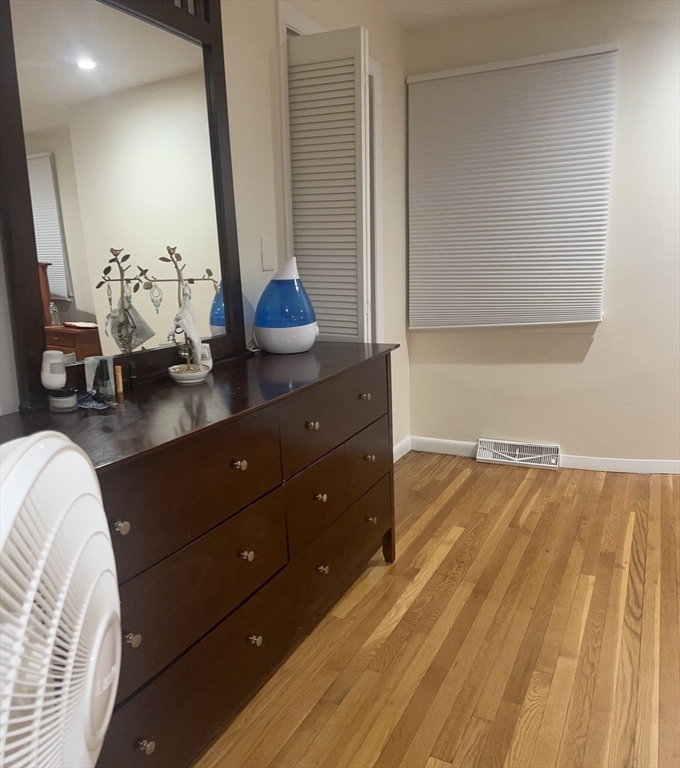 50 Main Street Medway, MA 02053 - Photo 13 of 23 a room with a bed and a dresser