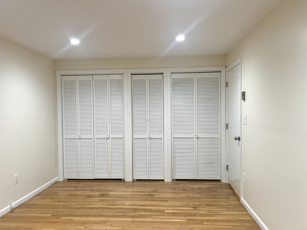 50 Main Street Medway, MA 02053 - Photo 15 of 23 an empty room with wooden floor