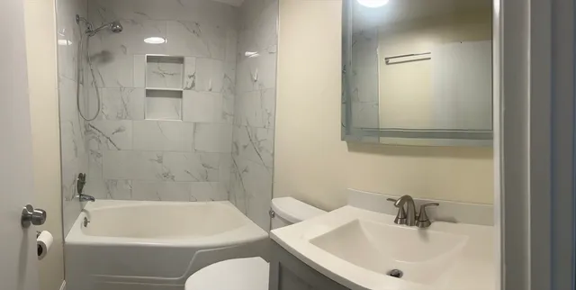 a bathroom with a sink and a bathtub