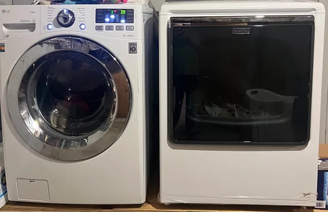 a close up view of washer and dryer