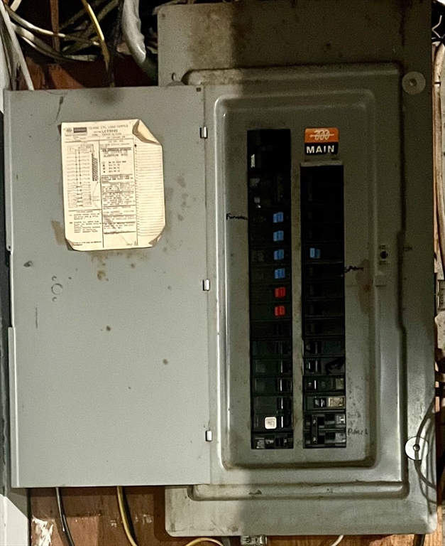 50 Main Street Medway, MA 02053 - Photo 21 of 23 front view of a door with a bench