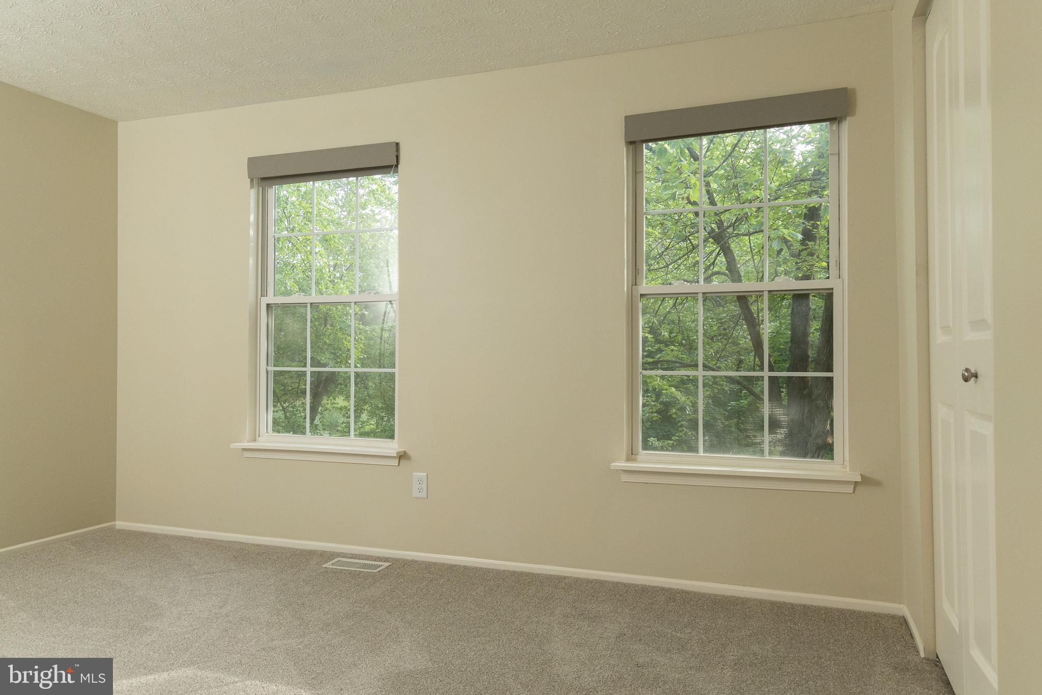 357 Council Oak Drive Severn, MD 21144 - Photo 13 of 37 an empty room with a window