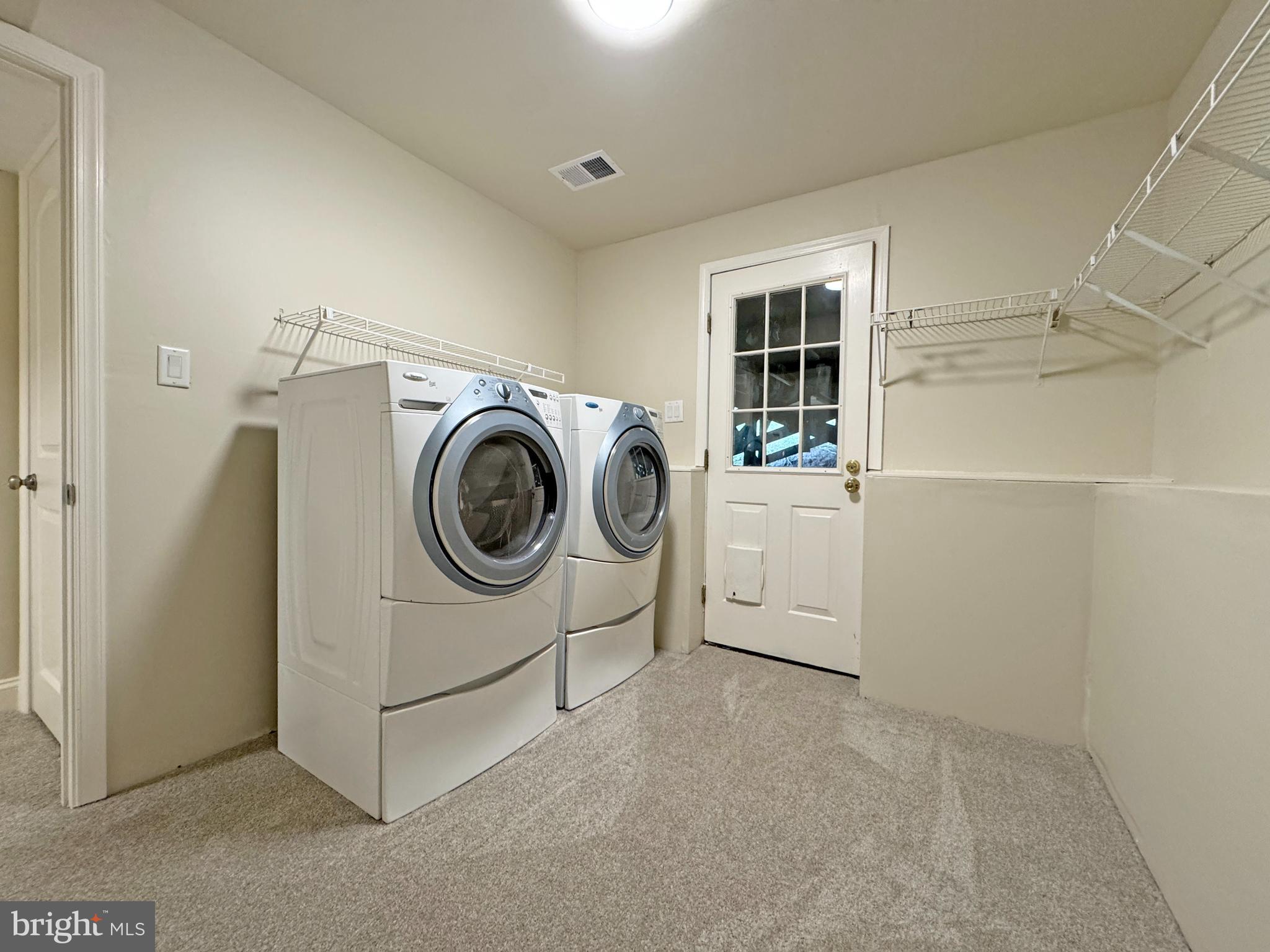 357 Council Oak Drive Severn, MD 21144 - Photo 21 of 37 a utility room with dryer and washer