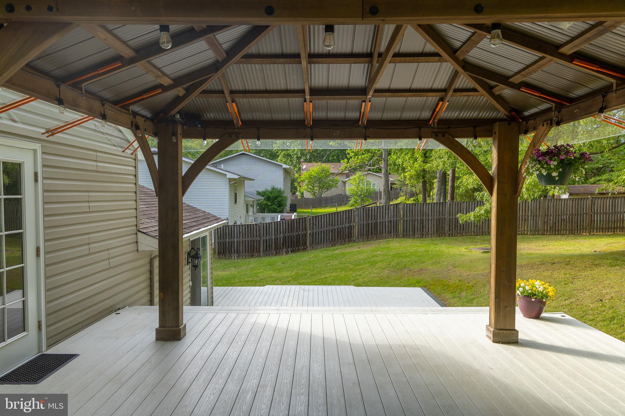 357 Council Oak Drive Severn, MD 21144 - Photo 22 of 37 a view of a porch with a backyard