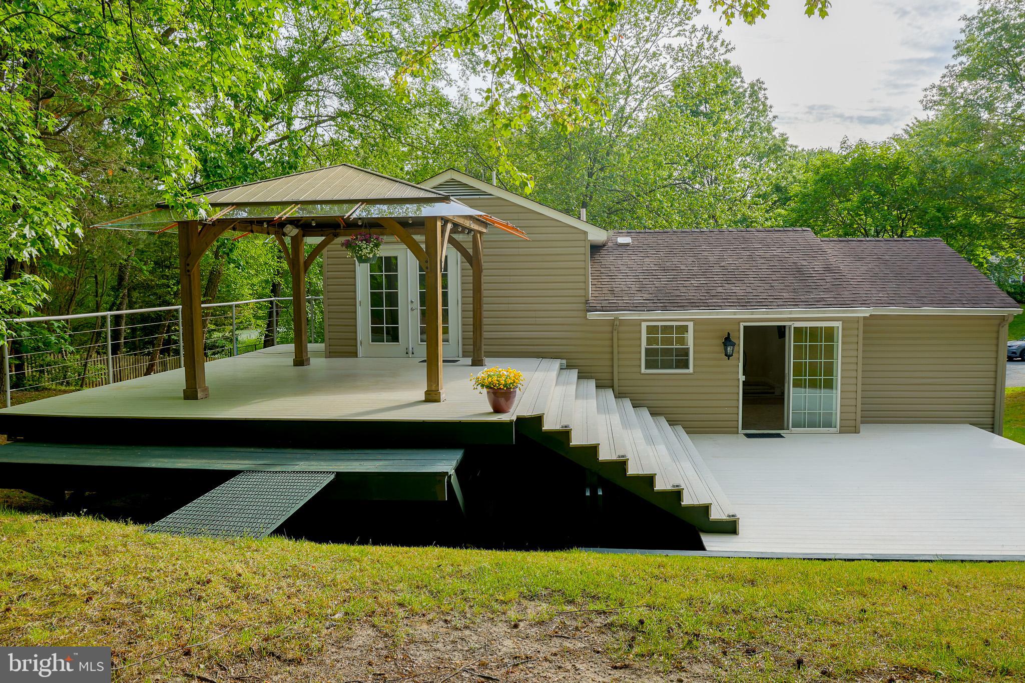 357 Council Oak Drive Severn, MD 21144 - Photo 24 of 37 a front view of a house with garden