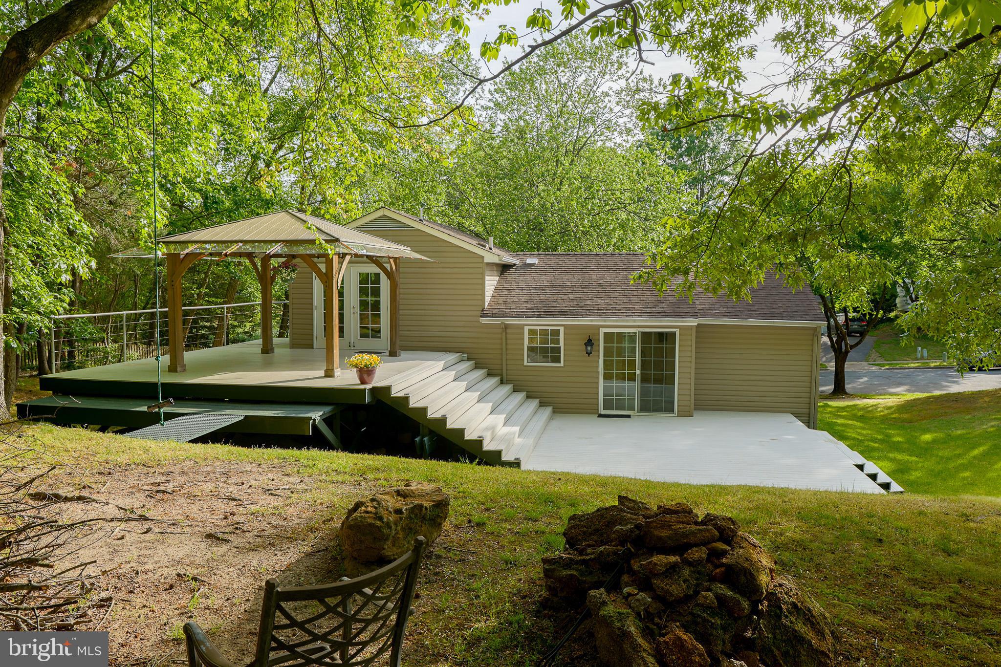 357 Council Oak Drive Severn, MD 21144 - Photo 26 of 37 a front view of a house with garden