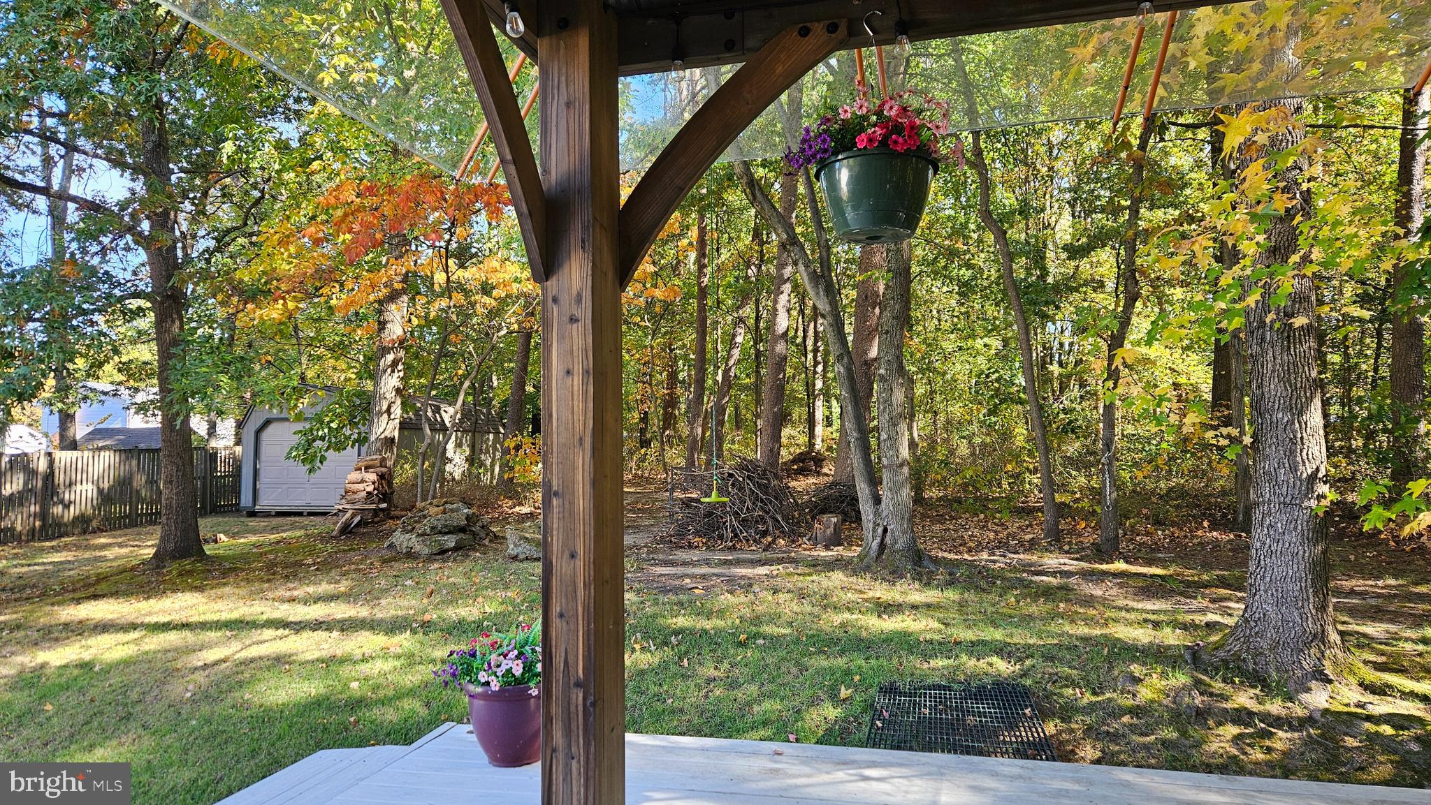 357 Council Oak Drive Severn, MD 21144 - Photo 36 of 37 a view of a yard with plants and large trees