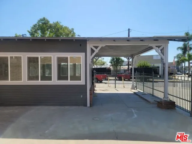 a view of a porch with furniture and floor