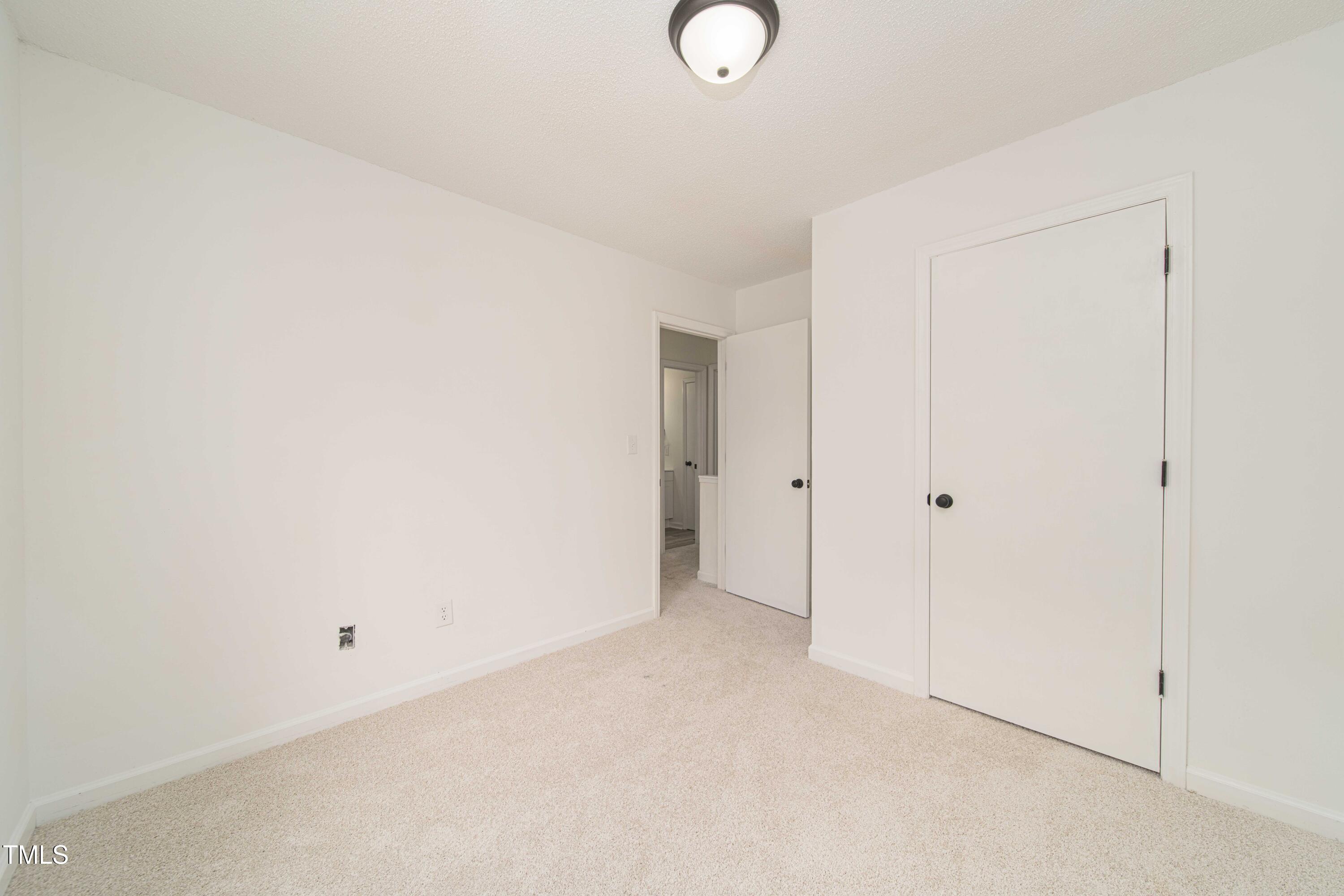 4258 Kaplan Drive Raleigh, NC 27606 - Photo 11 of 20 a view of an empty room