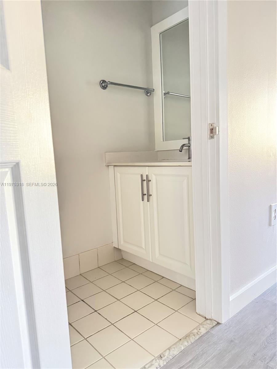 978 Northeast 42nd Place, Unit 978 Homestead, FL 33033 - Photo 5 of 21 1st Floor Half Bathroom