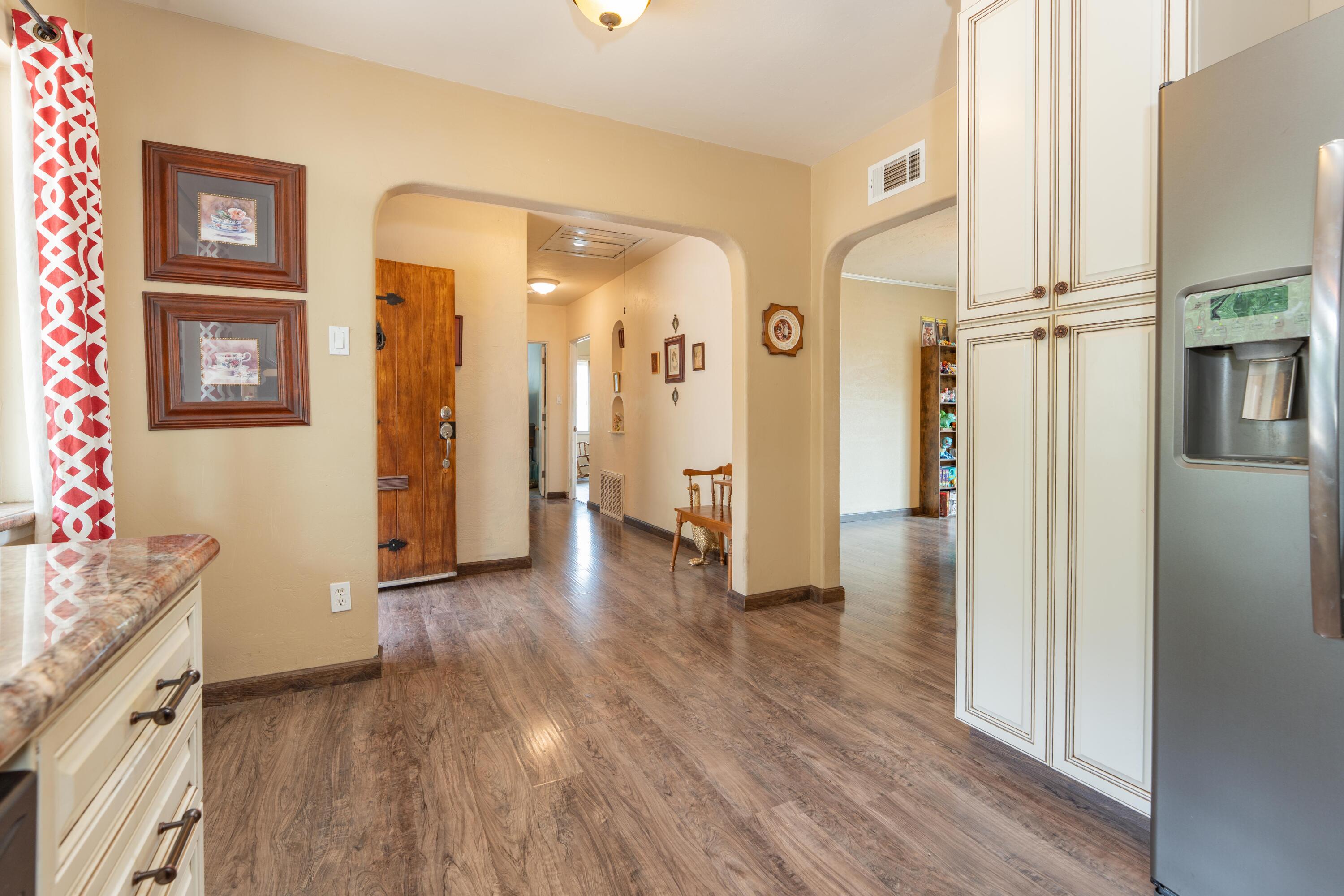 570 North Birch Avenue Reedley, CA 93654 - Photo 18 of 52 a view of livingroom with hardwood floor and hallway