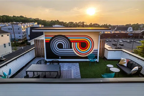 a bedroom with bed and window