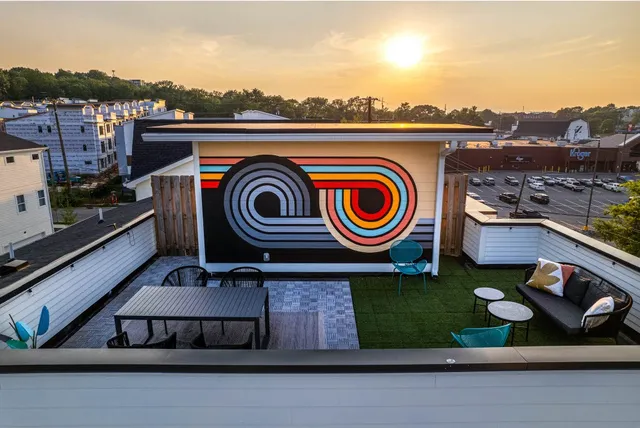 a bedroom with bed and window