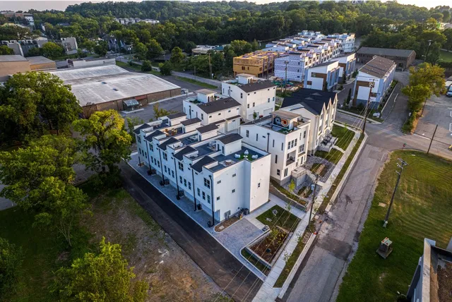 a view of a two chairs in the balcony