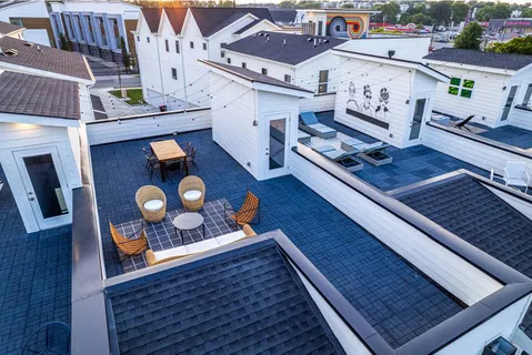 a bed room with a bed and a window