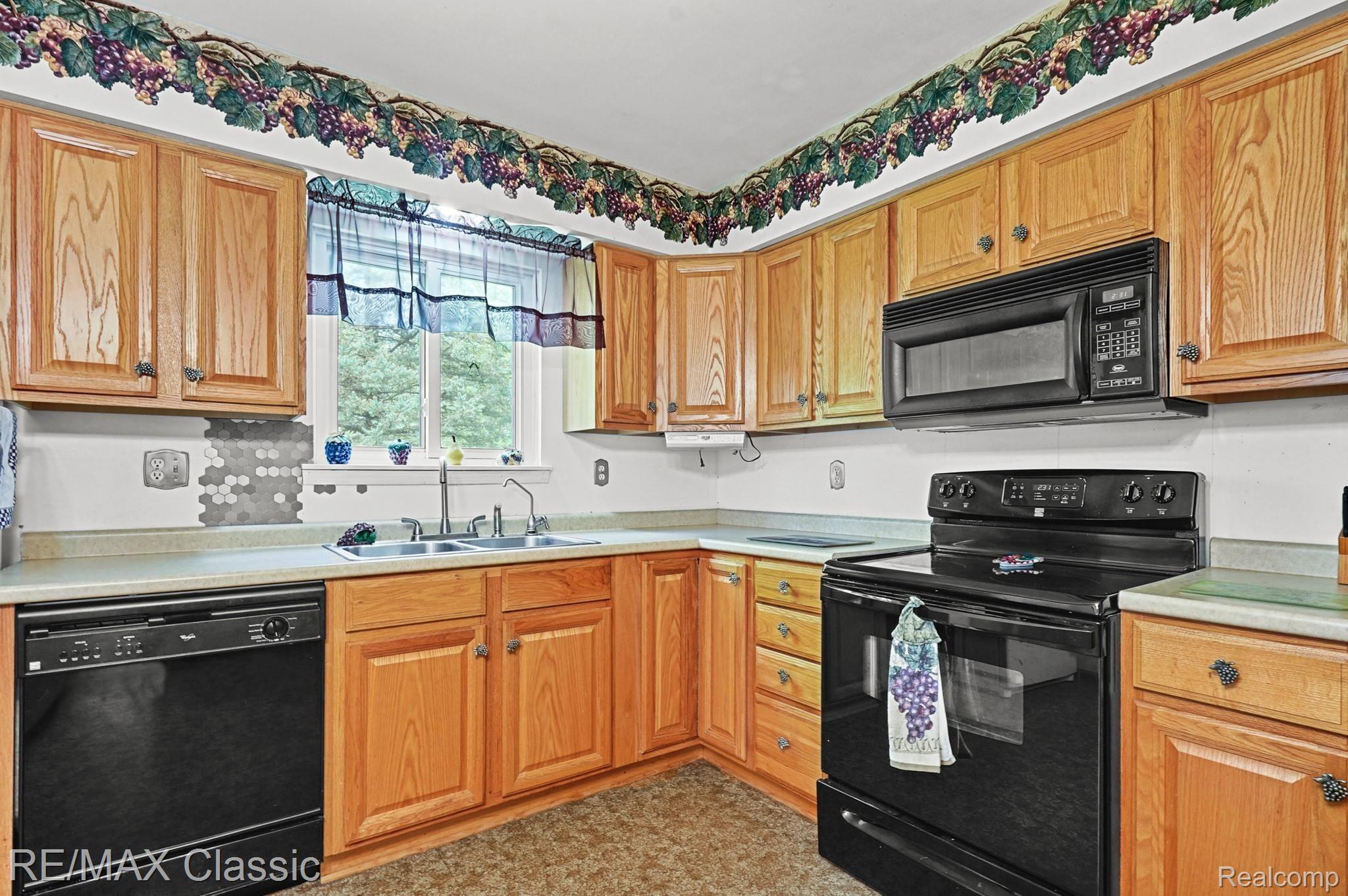 11158 9 Mile Road South Lyon, MI 48178 - Photo 18 of 26 Includes the Appliances