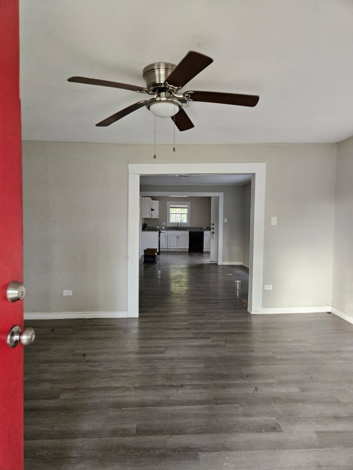 311 South Amburn Road Texas City, TX 77591 - Photo 7 of 7 a view of empty room with wooden floor and fan