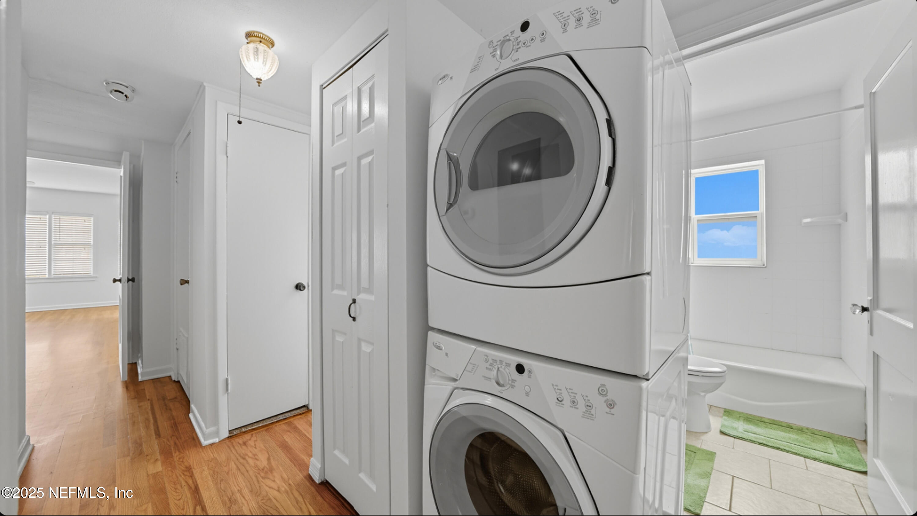 2604 Bayview Road Jacksonville, FL 32210 - Photo 14 of 31 a view of a hallway with washer and dryer