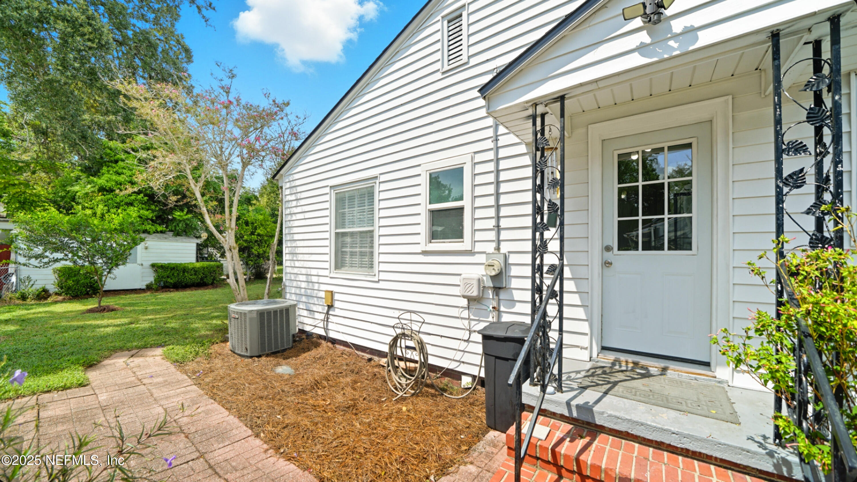 2604 Bayview Road Jacksonville, FL 32210 - Photo 22 of 31 a front view of a house with a yard