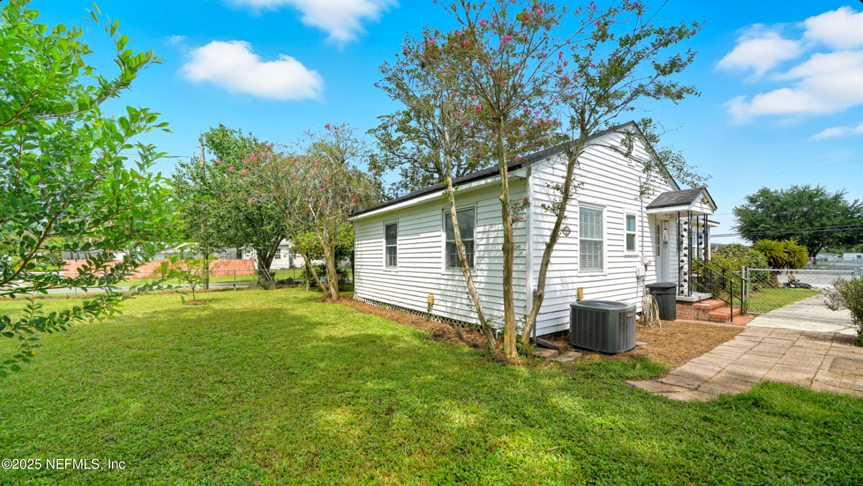 2604 Bayview Road Jacksonville, FL 32210 - Photo 23 of 31 a view of a house with backyard and sitting area
