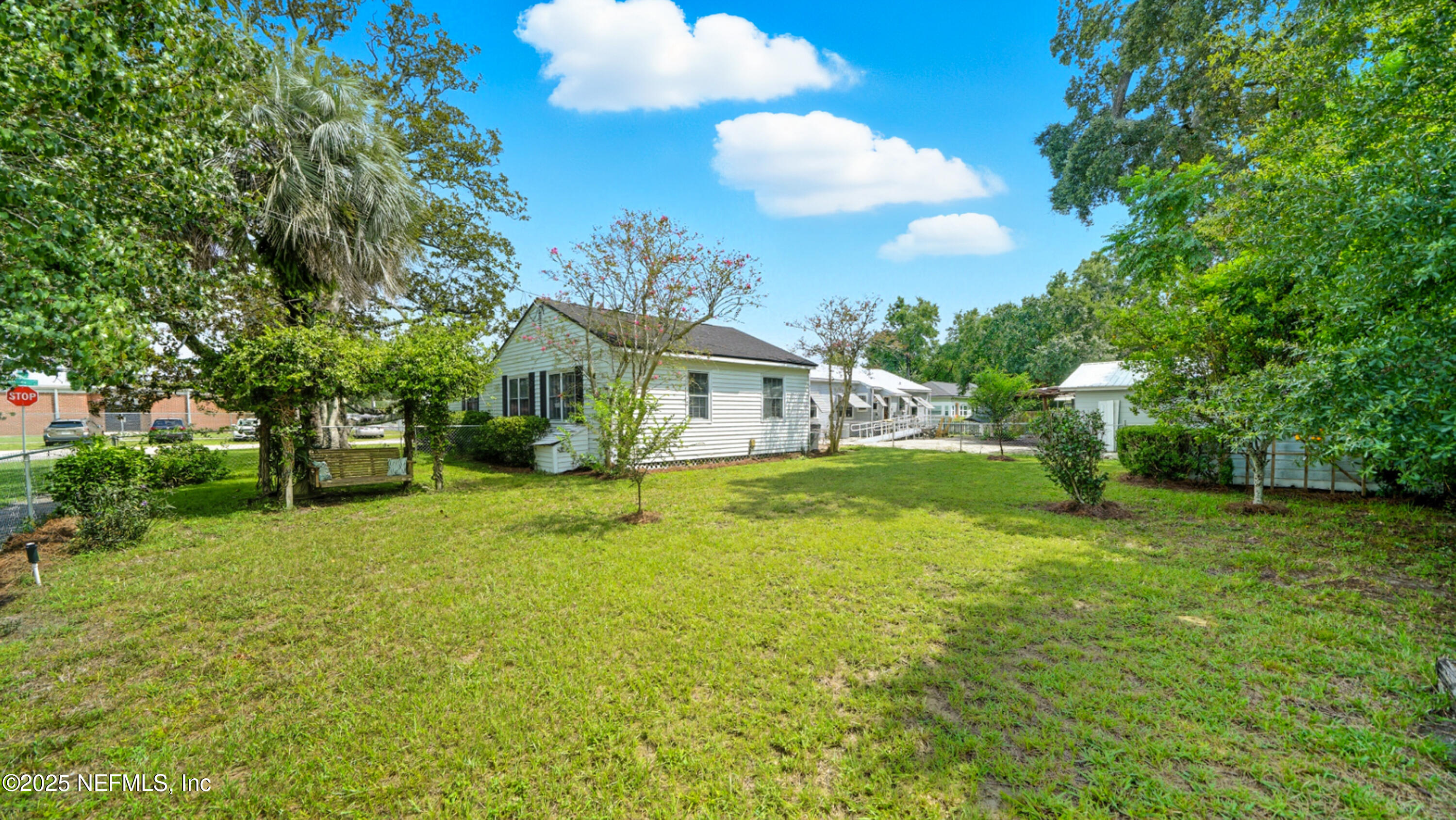 2604 Bayview Road Jacksonville, FL 32210 - Photo 24 of 31 a view of a house with a yard