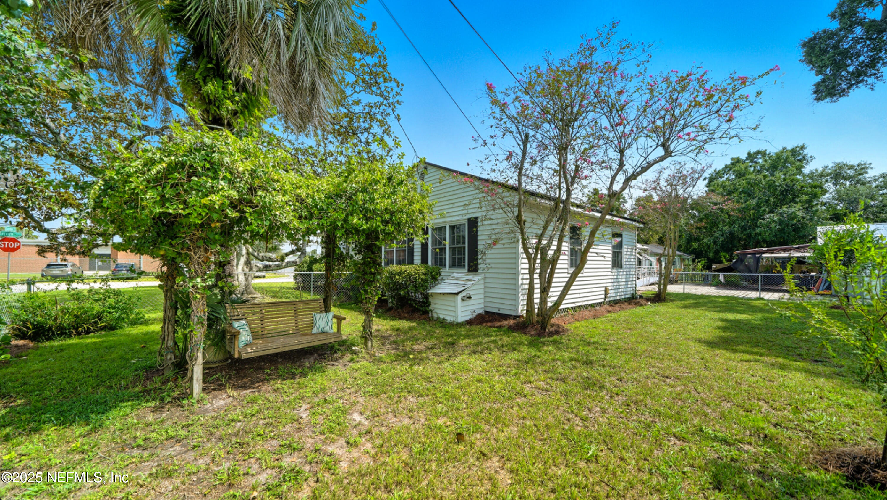 2604 Bayview Road Jacksonville, FL 32210 - Photo 25 of 31 a view of a house with a yard
