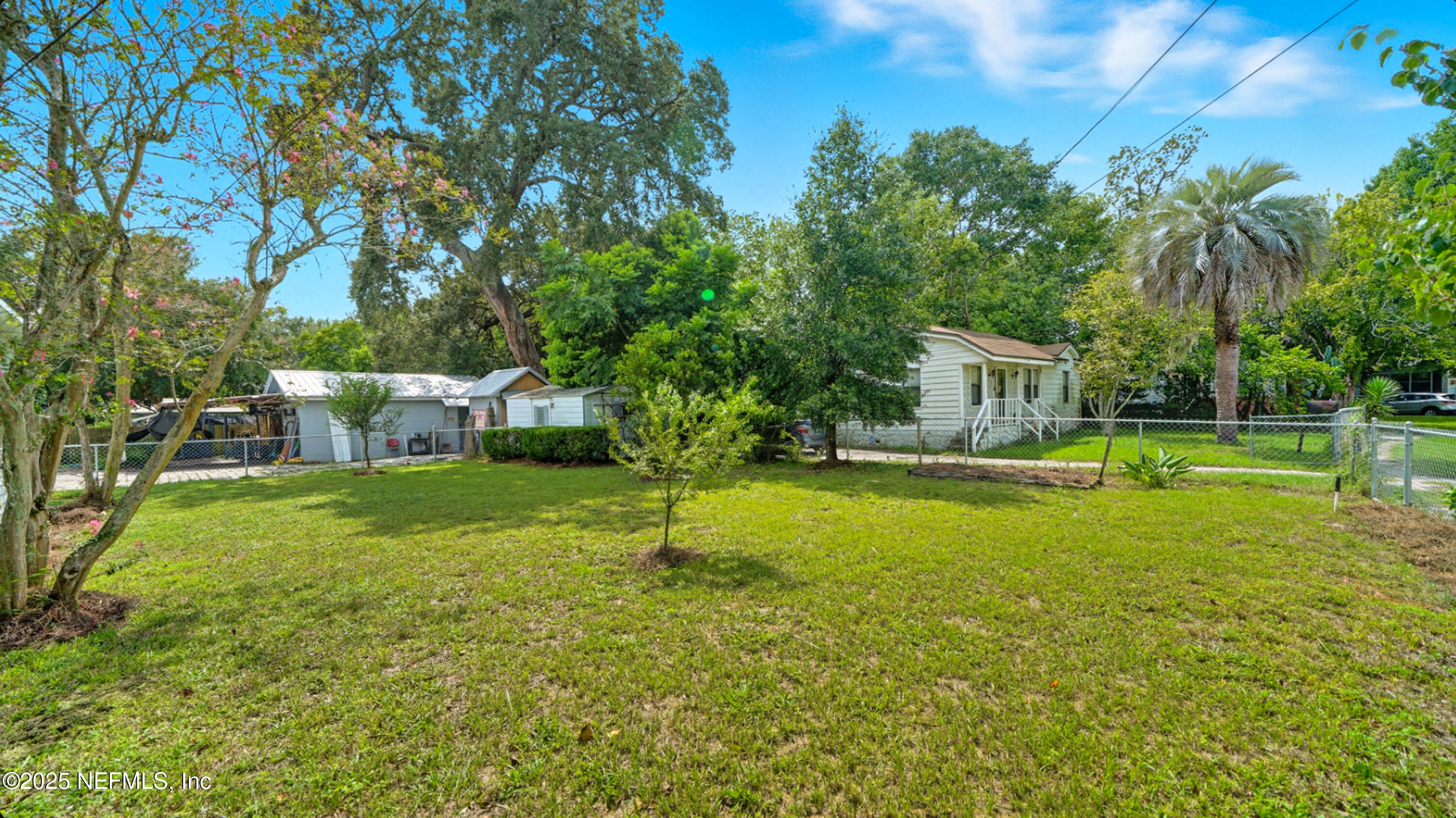 2604 Bayview Road Jacksonville, FL 32210 - Photo 26 of 31 a view of a house with a yard porch and sitting area
