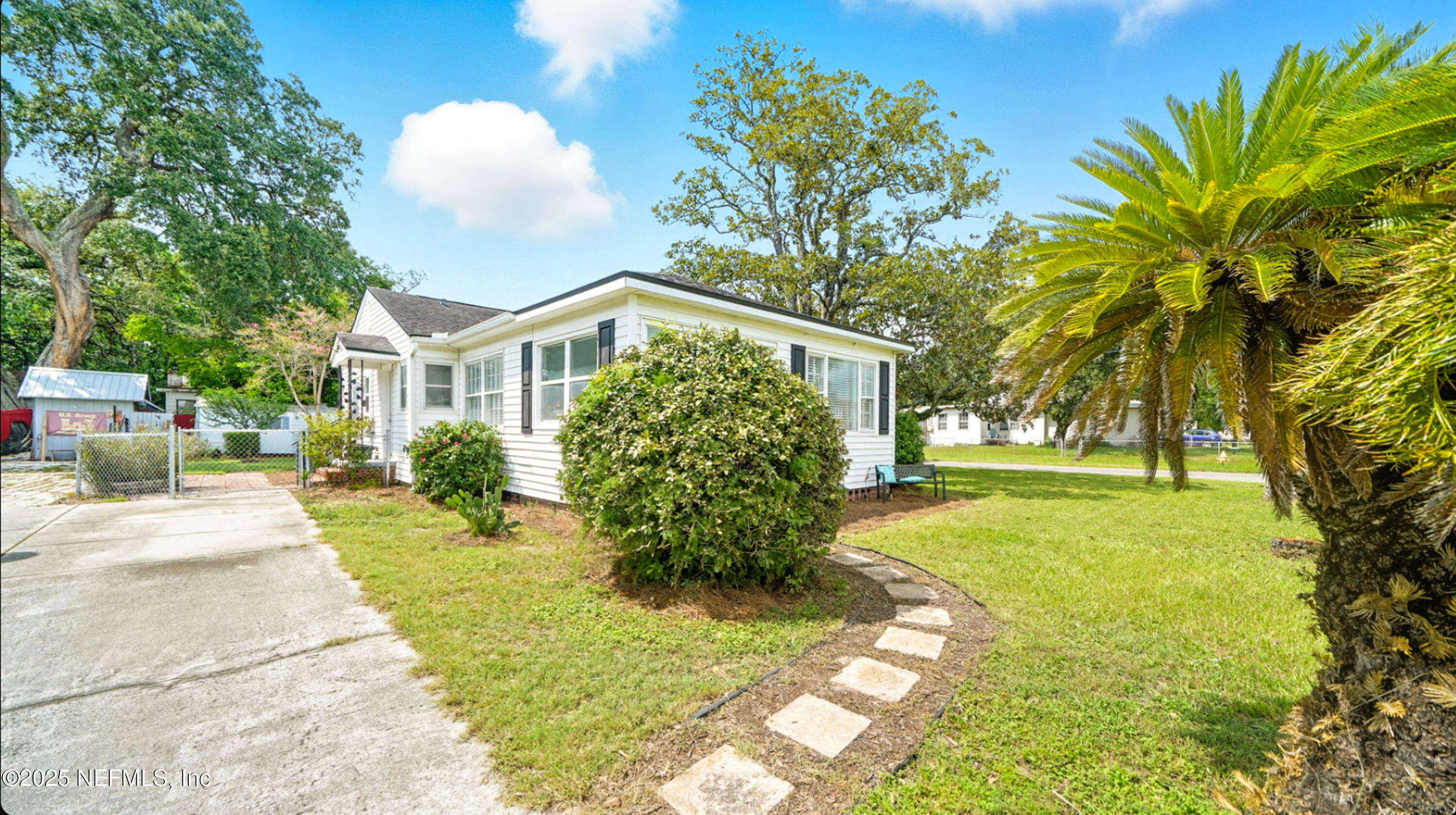 2604 Bayview Road Jacksonville, FL 32210 - Photo 29 of 31 a front view of a house with garden