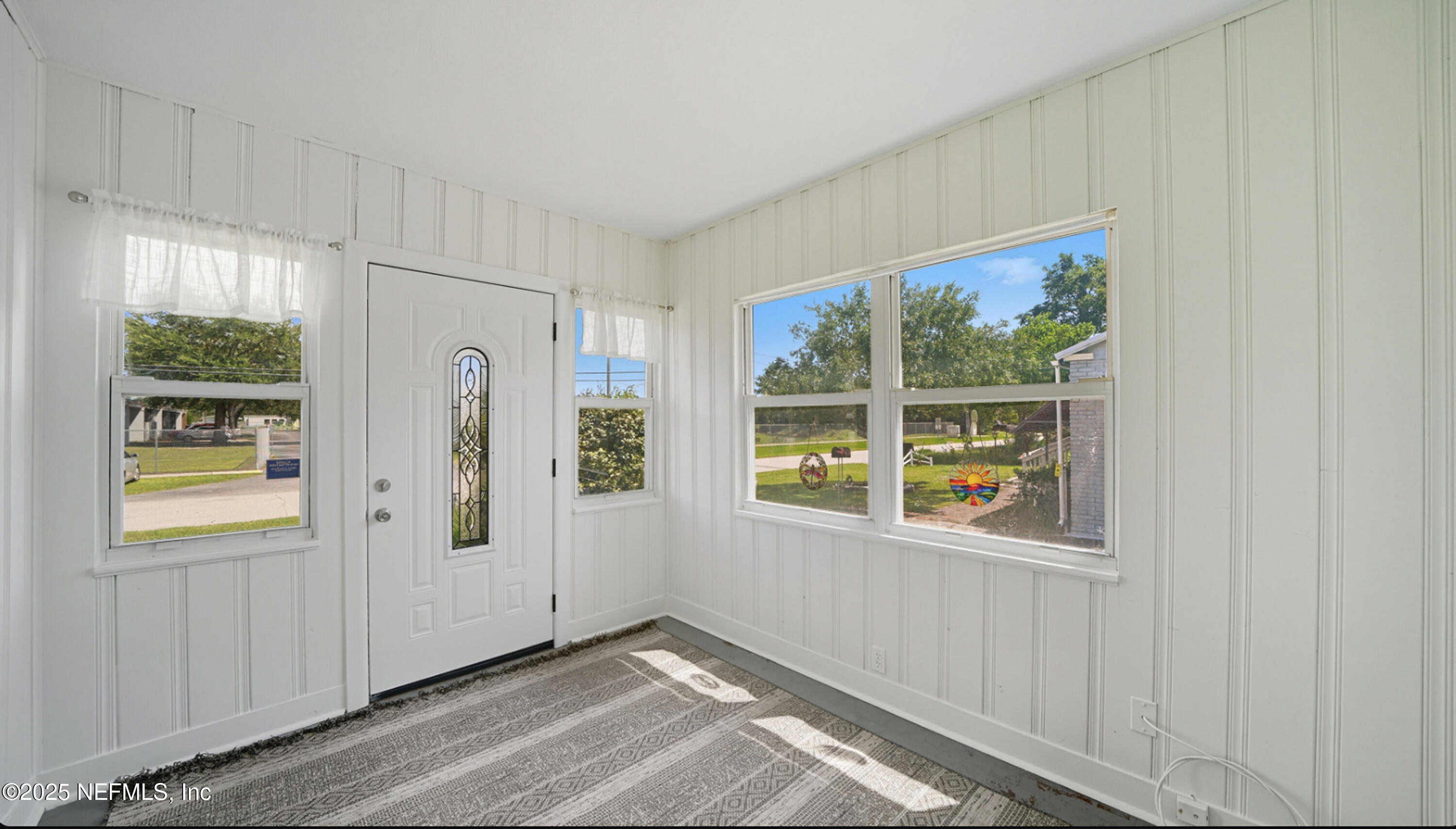 2604 Bayview Road Jacksonville, FL 32210 - Photo 3 of 31 a view of an empty room with a window