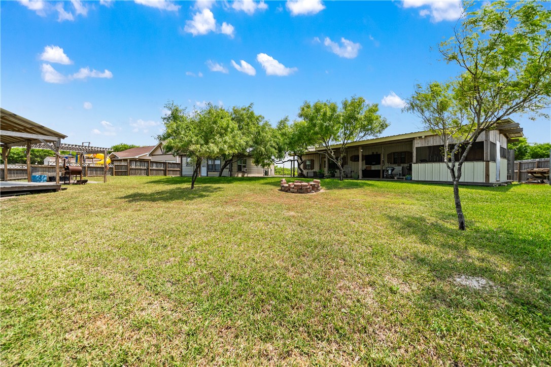 1356 Neubauer Point Road Riviera, TX 78379 - Photo 13 of 40 a view of a house with a yard and sitting area