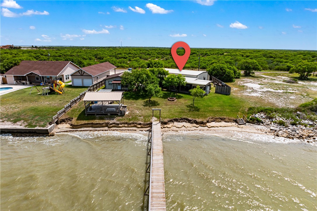 1356 Neubauer Point Road Riviera, TX 78379 - Photo 19 of 40 a front view of a house with a yard