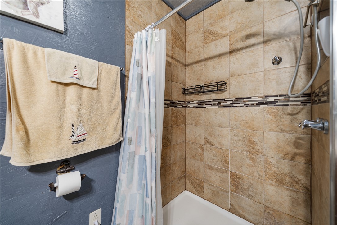 1356 Neubauer Point Road Riviera, TX 78379 - Photo 30 of 40 a bathroom with a shower