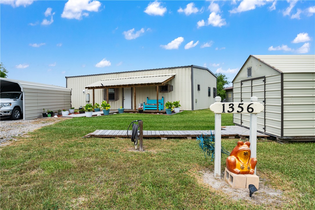 1356 Neubauer Point Road Riviera, TX 78379 - Photo 3 of 40 a view of an house with backyard space and garden