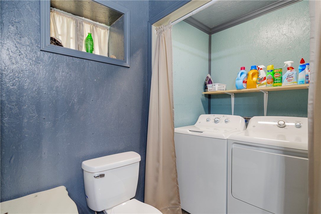 1356 Neubauer Point Road Riviera, TX 78379 - Photo 35 of 40 a bathroom with a toilet and a sink
