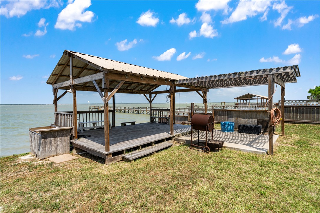 1356 Neubauer Point Road Riviera, TX 78379 - Photo 10 of 40 a roof deck with table and chairs