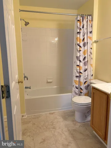 a bathroom with a toilet and a sink