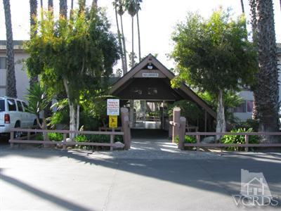 a view of street with sitting area