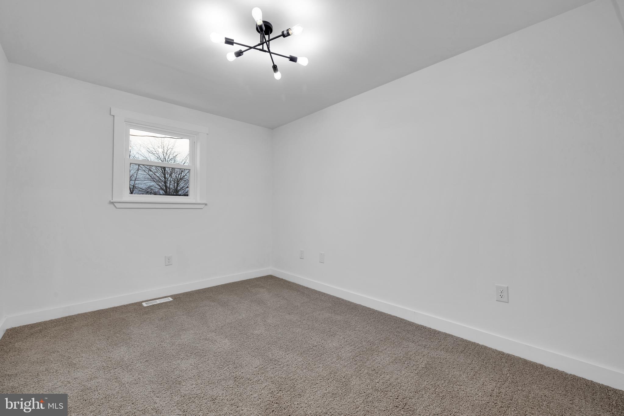 119 Heidelberg Avenue Reading, PA 19606 - Photo 23 of 38 a view of room with a ceiling fan and window