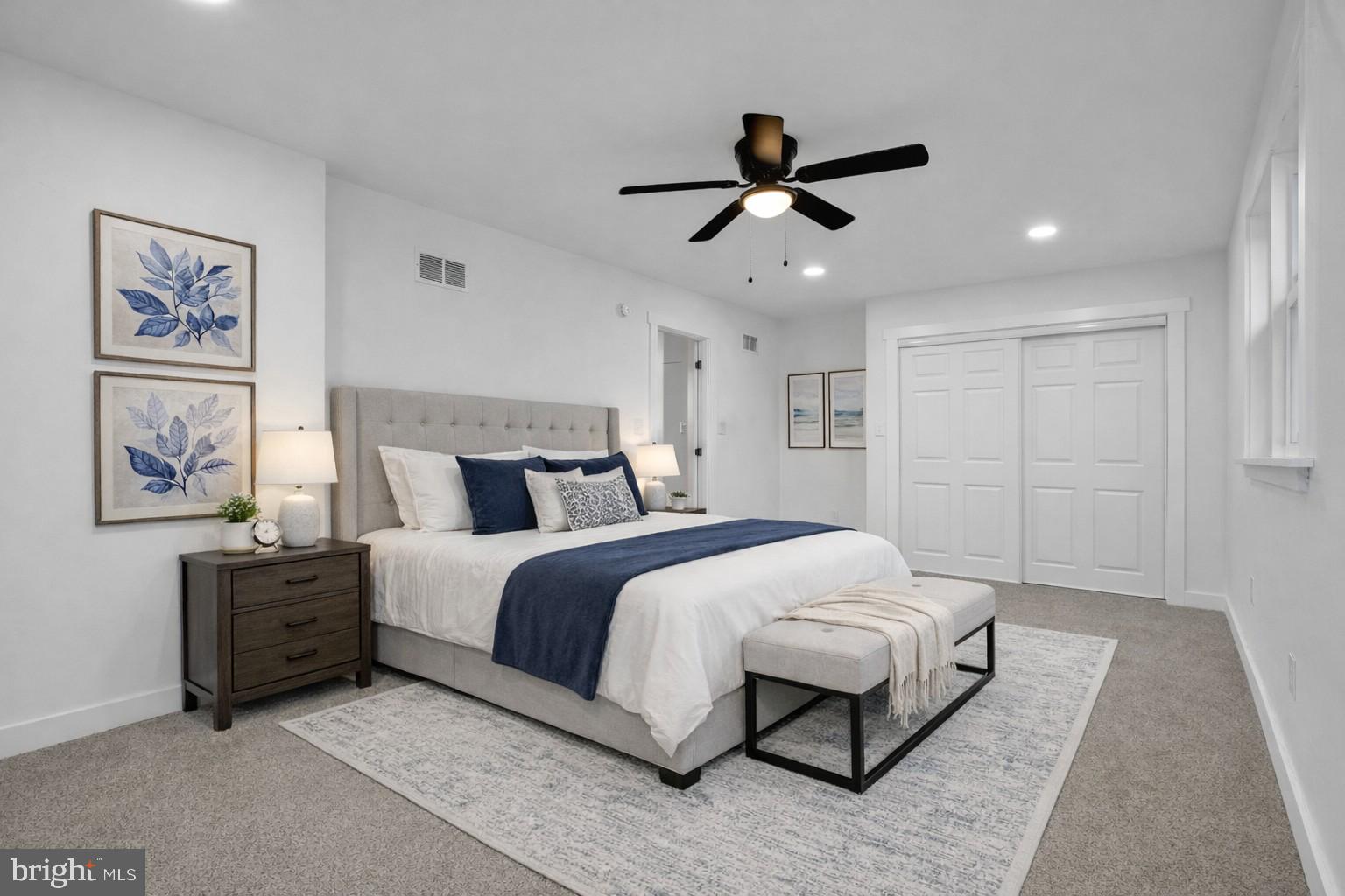 119 Heidelberg Avenue Reading, PA 19606 - Photo 28 of 38 a bedroom with a large bed and a chandelier