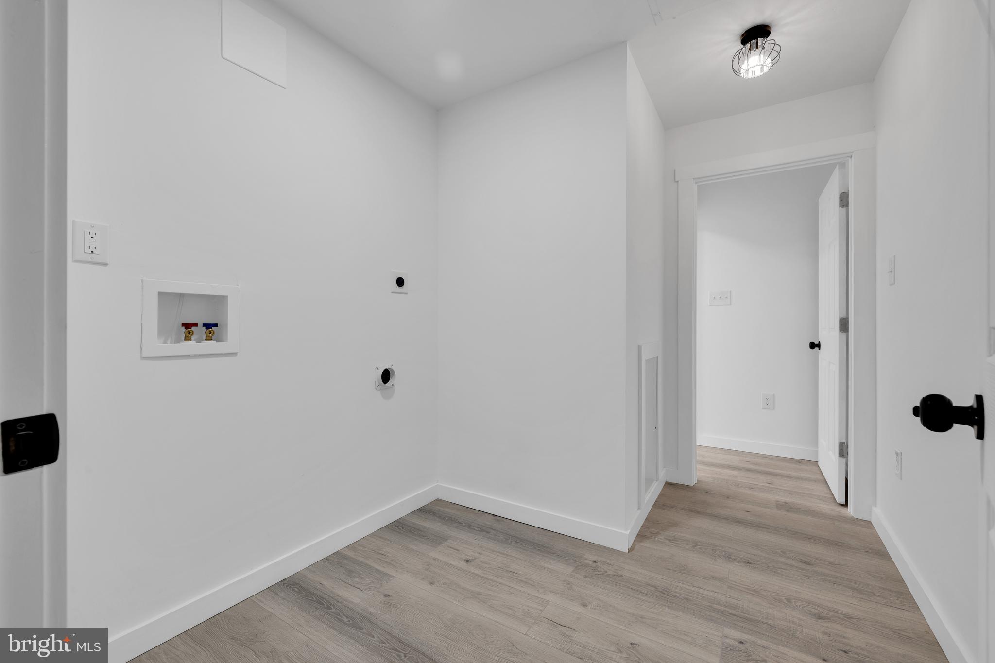 119 Heidelberg Avenue Reading, PA 19606 - Photo 33 of 38 a view of a hallway with wooden floor
